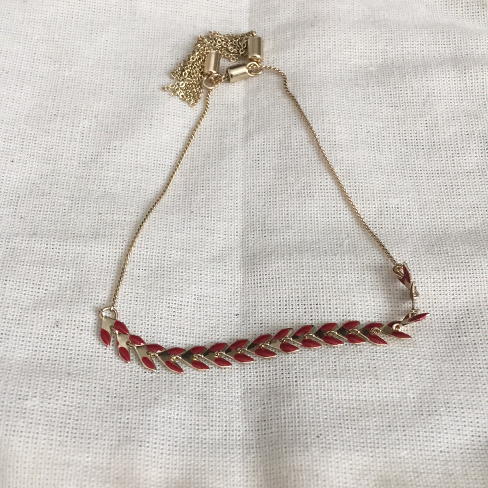Red and gold tassel bracelet